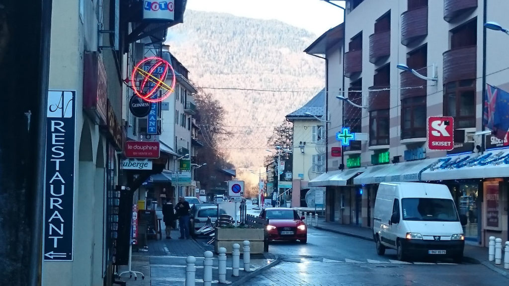 The main street through the centre of Brides-les-Bains - Brides-les-Bains guide showing bars and restaurants in Brides-les-Bains